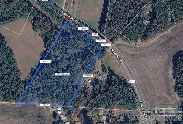 a view of a street with a yard