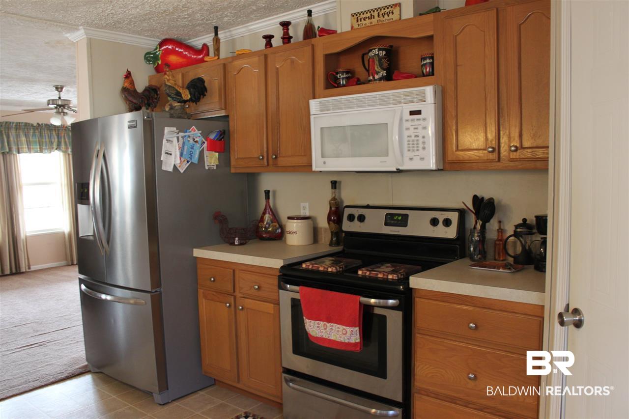 9380 Spice Pond Road Eight Mile, AL 36613 - Photo 25 of 36 Cabinets, cabinets, and more cabinets!