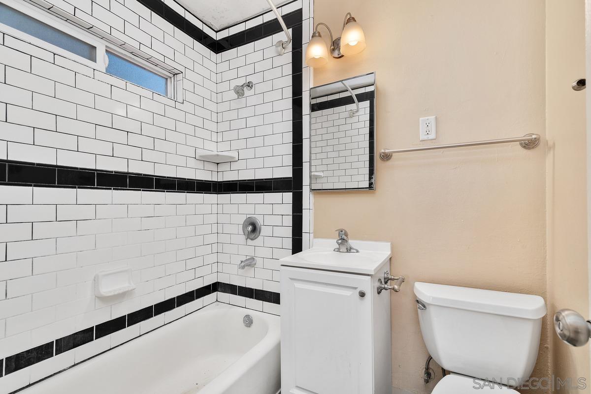 3378 B Street San Diego, CA 92102 - Photo 12 of 27 a bathroom with a sink toilet and shower