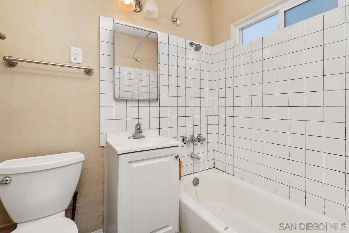 3378 B Street San Diego, CA 92102 - Photo 25 of 27 a bathroom with a sink toilet and shower