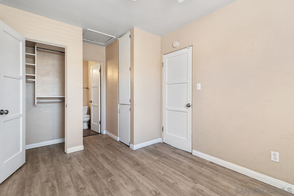 3378 B Street San Diego, CA 92102 - Photo 10 of 27 a view of an empty room with wooden floor and closet