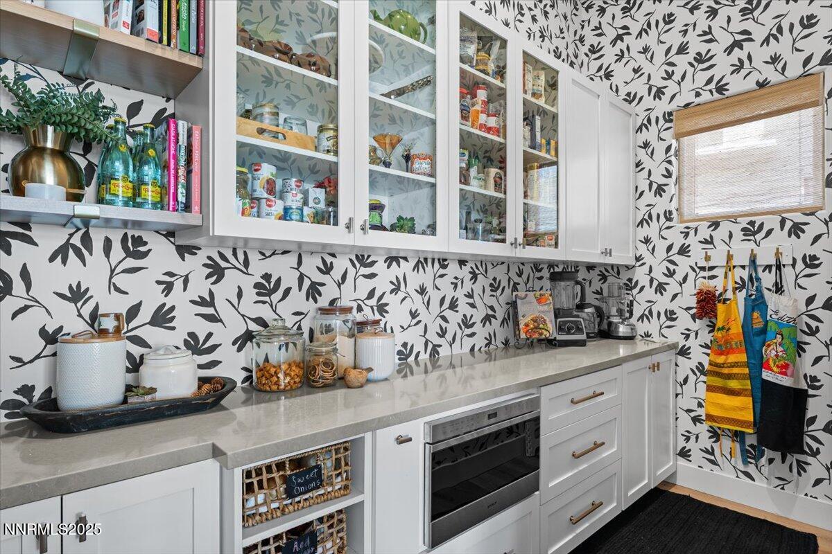 1593 River Hill Way Reno, NV 89523 - Photo 13 of 63 a kitchen with stainless steel appliances a stove and a sink