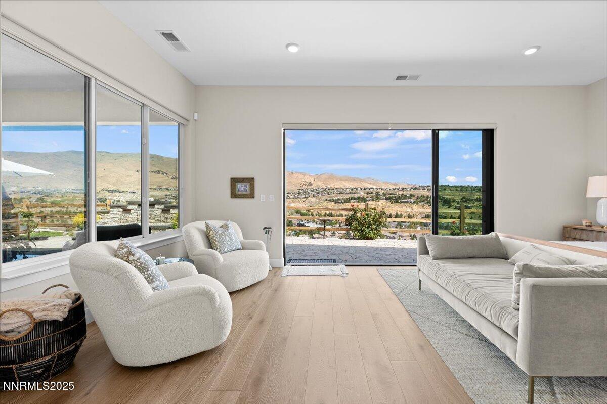 1593 River Hill Way Reno, NV 89523 - Photo 16 of 63 a living room with furniture and a large window