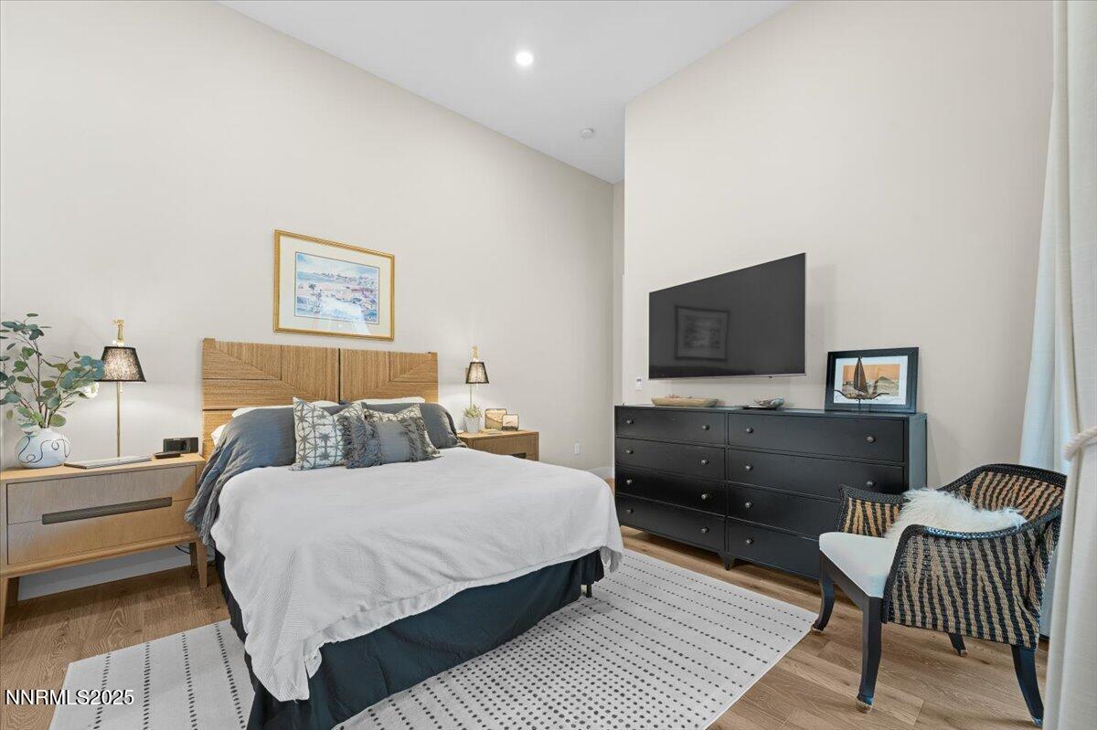 1593 River Hill Way Reno, NV 89523 - Photo 25 of 63 a bedroom with a bed and a television