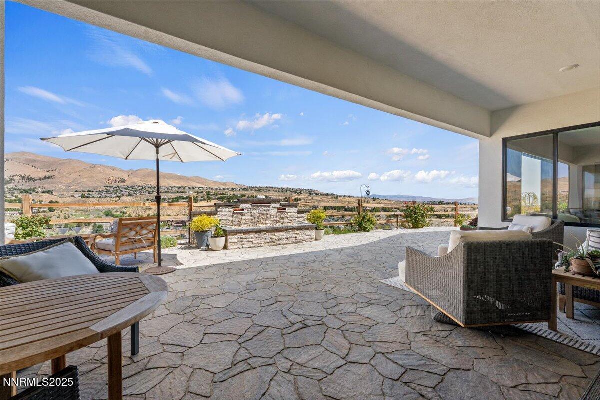1593 River Hill Way Reno, NV 89523 - Photo 31 of 63 a view of a terrace with furniture and a garden