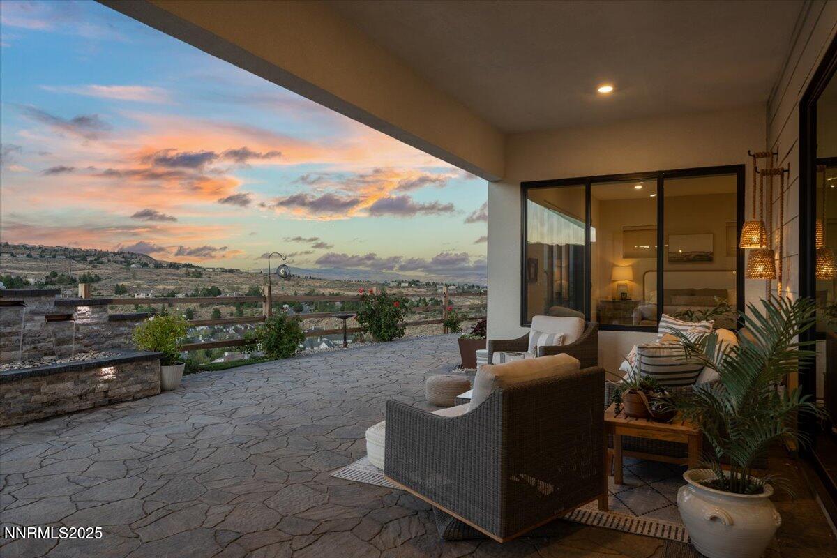 1593 River Hill Way Reno, NV 89523 - Photo 40 of 63 a balcony with furniture and a view of lake