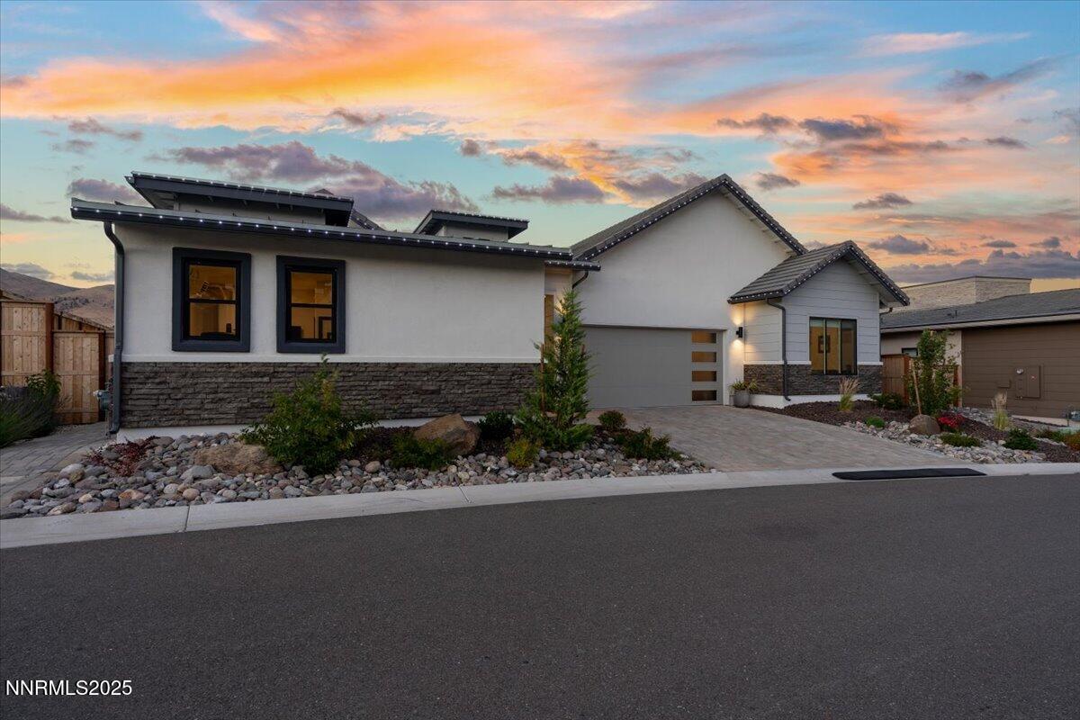 1593 River Hill Way Reno, NV 89523 - Photo 42 of 63 a front view of a house with a garden