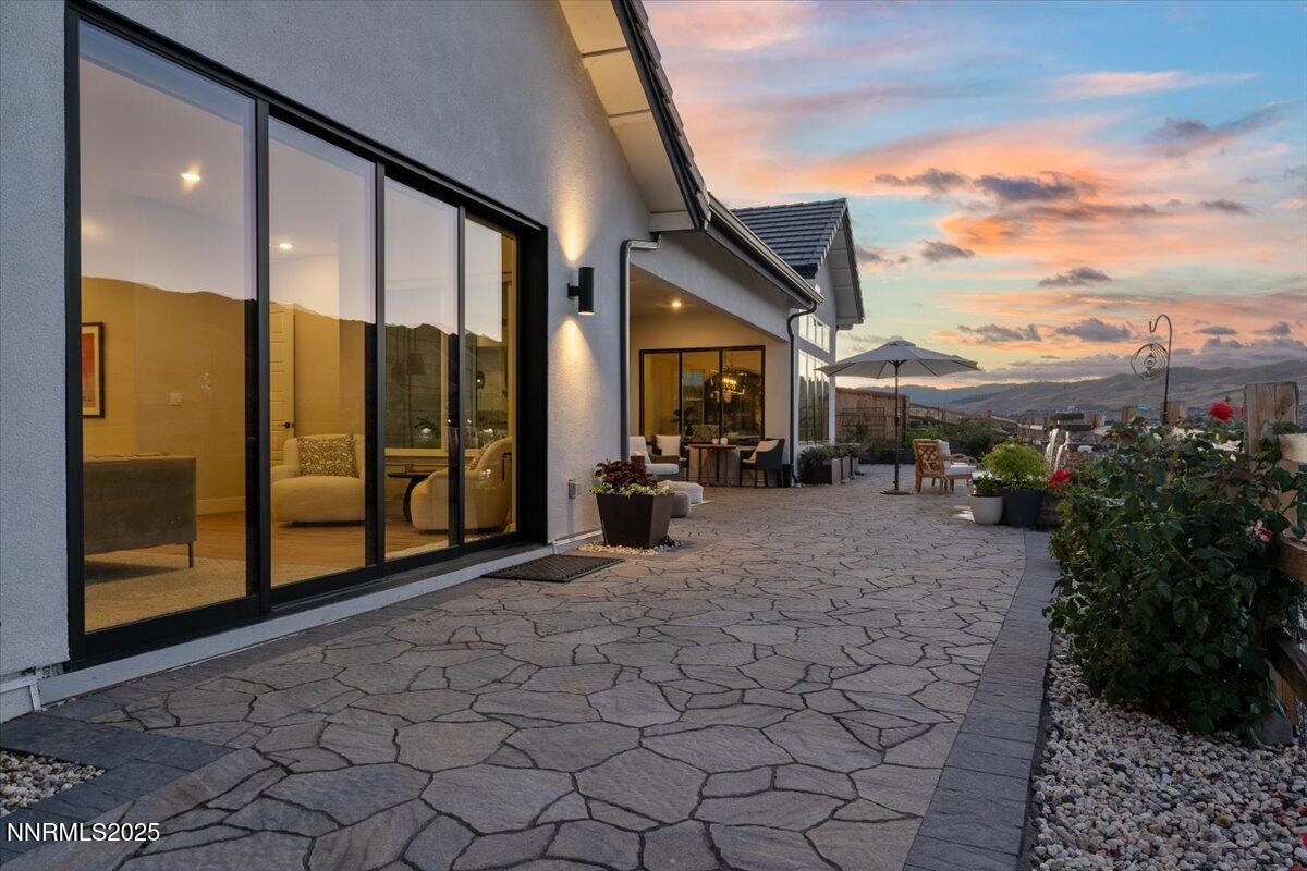 1593 River Hill Way Reno, NV 89523 - Photo 43 of 63 a view of a building with an outdoor space and seating area