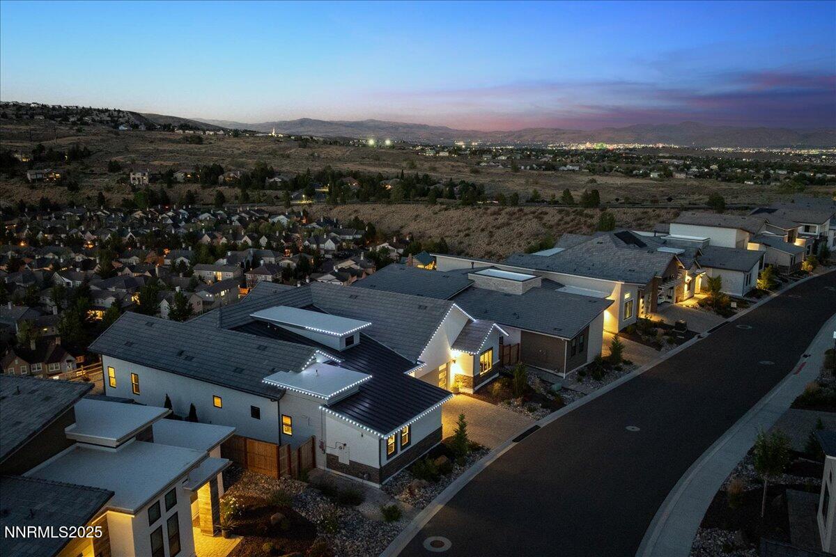 1593 River Hill Way Reno, NV 89523 - Photo 54 of 63 an aerial view of a house with a mountain view