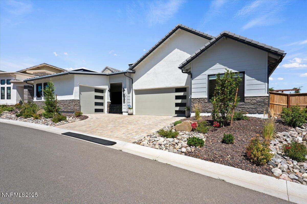 1593 River Hill Way Reno, NV 89523 - Photo 59 of 63 a front view of a house with garden