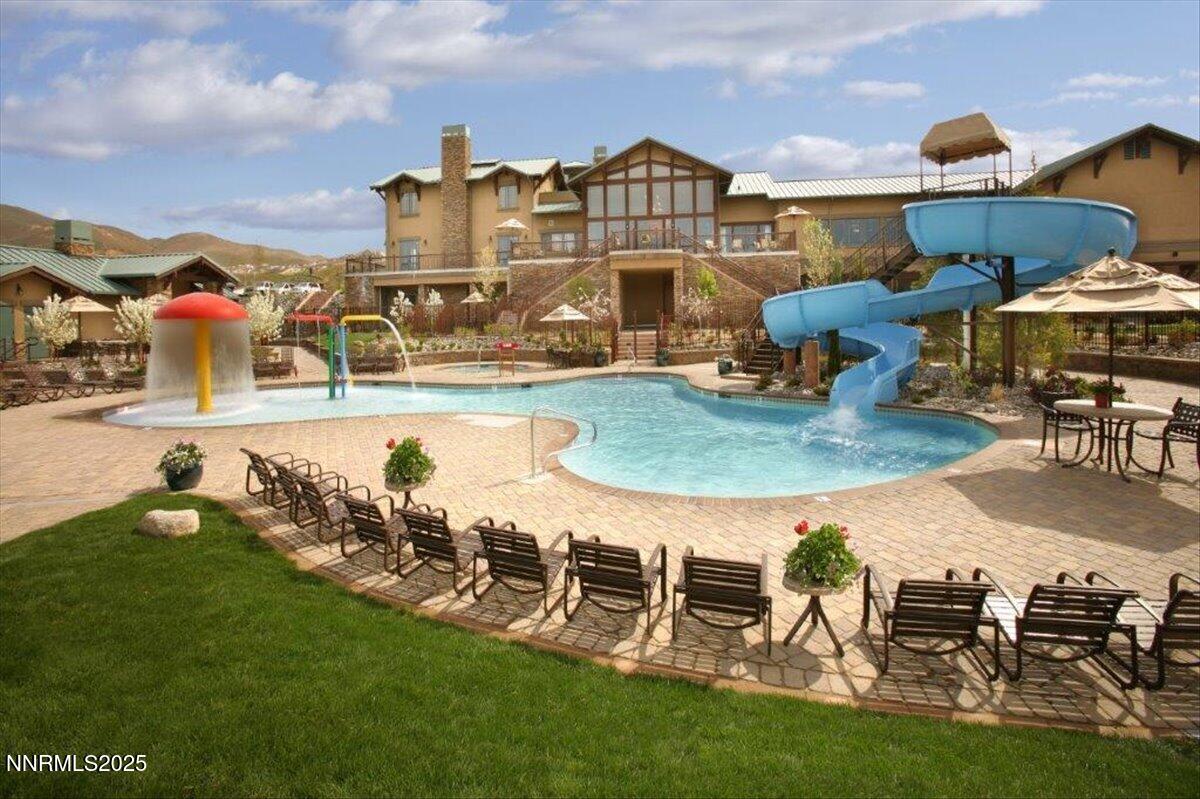 1593 River Hill Way Reno, NV 89523 - Photo 60 of 63 an aerial view of a house swimming pool a yard and outdoor seating