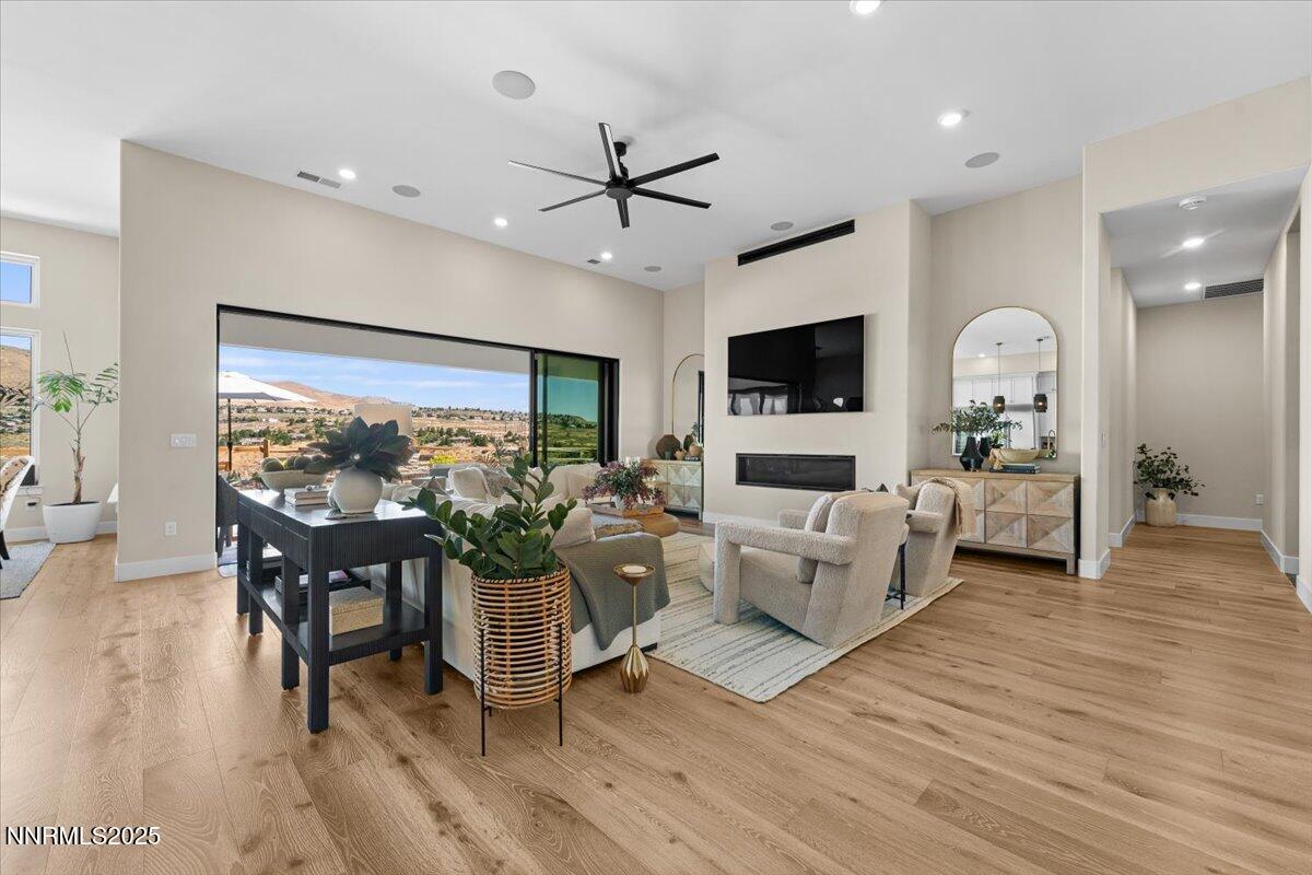 1593 River Hill Way Reno, NV 89523 - Photo 7 of 63 a living room with fireplace furniture and a flat screen tv