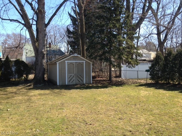 1267 Roland Road Lyndhurst, OH 44124 - Photo 24 of 24 The fully fenced back yard features a large shed!