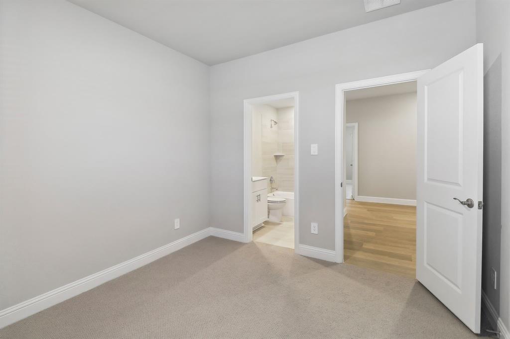 905 Buffalo Drive Lowry Crossing, TX 75407 - Photo 17 of 28 wooden floor and cabinet in a room