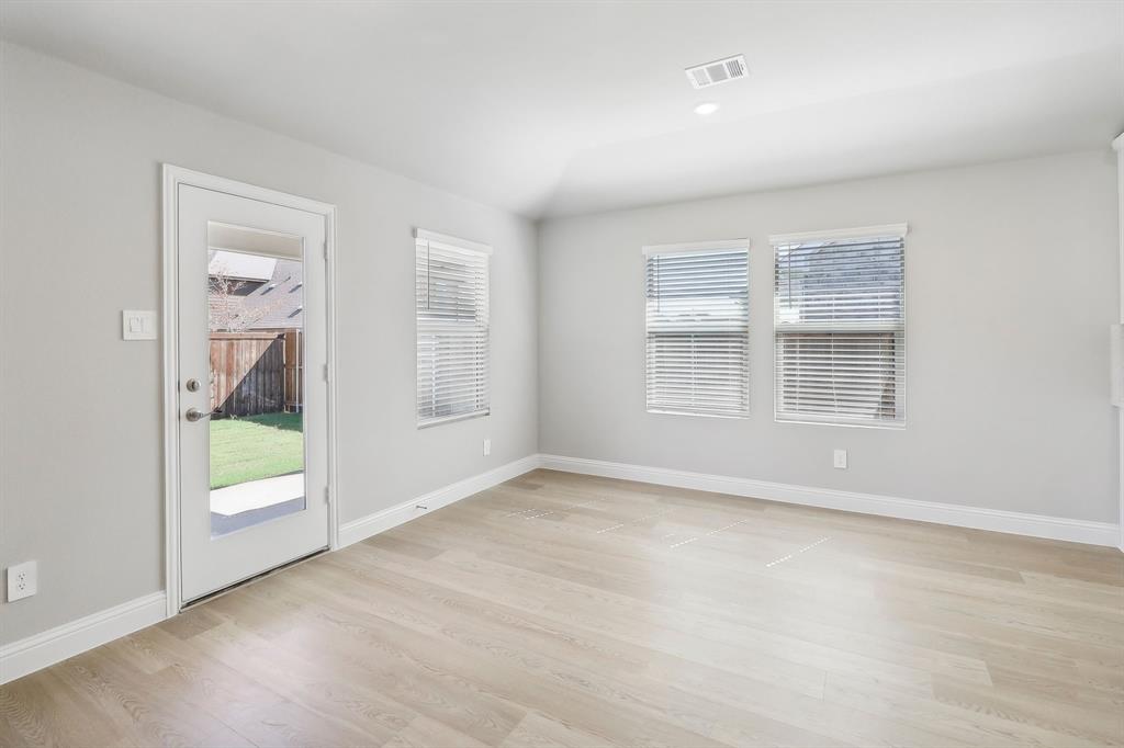 905 Buffalo Drive Lowry Crossing, TX 75407 - Photo 7 of 28 an empty room with windows