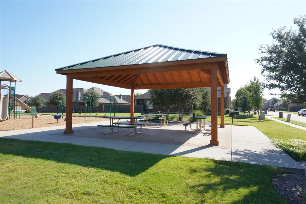 15608 Cornwallis Street Frisco, TX 75036 - Photo 20 of 23 a view of a playground with a garden