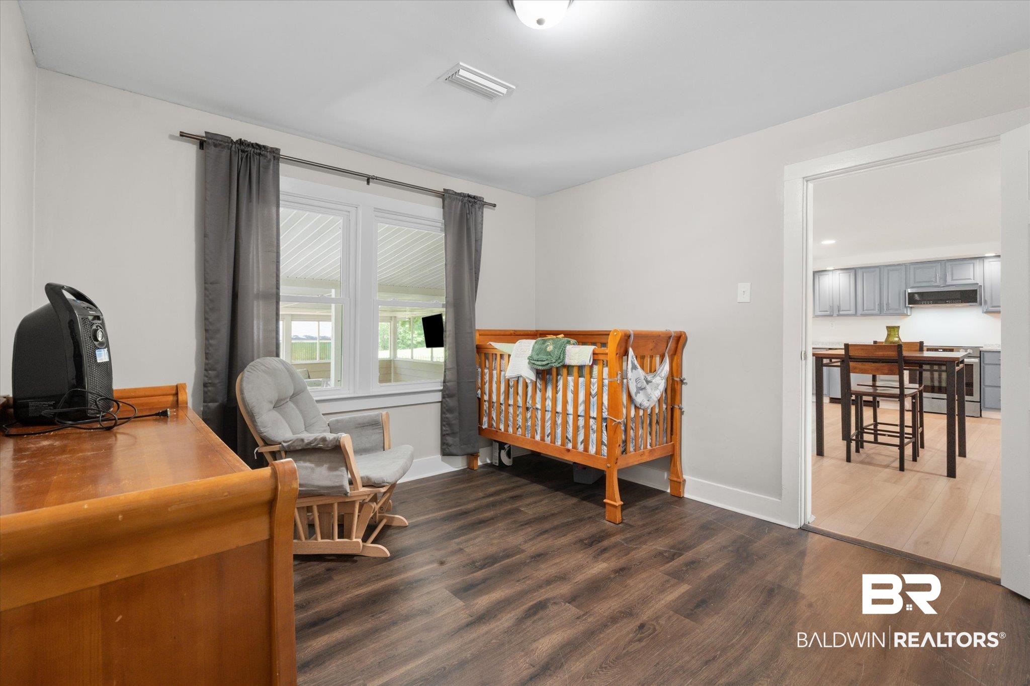 529 Cleveland Road Saraland, AL 36571 - Photo 22 of 31 Bedroom with wood finished floors, baseboards, and visible vents