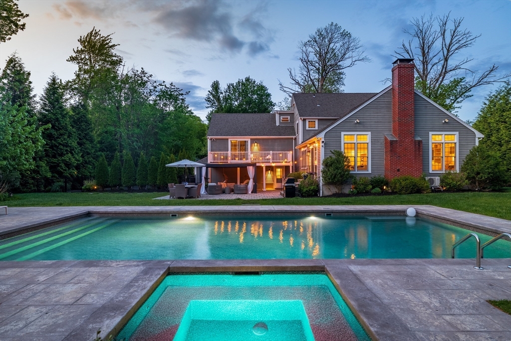 85 Old Farm Road Milton, MA 02186 - Photo 40 of 42 a house with swimming pool in front of it