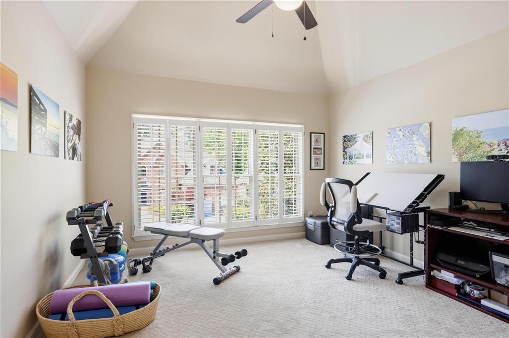 5249 Magnolia Walk Circle Atlanta, GA 30338 - Photo 24 of 30 a view of a livingroom with workspace and a window