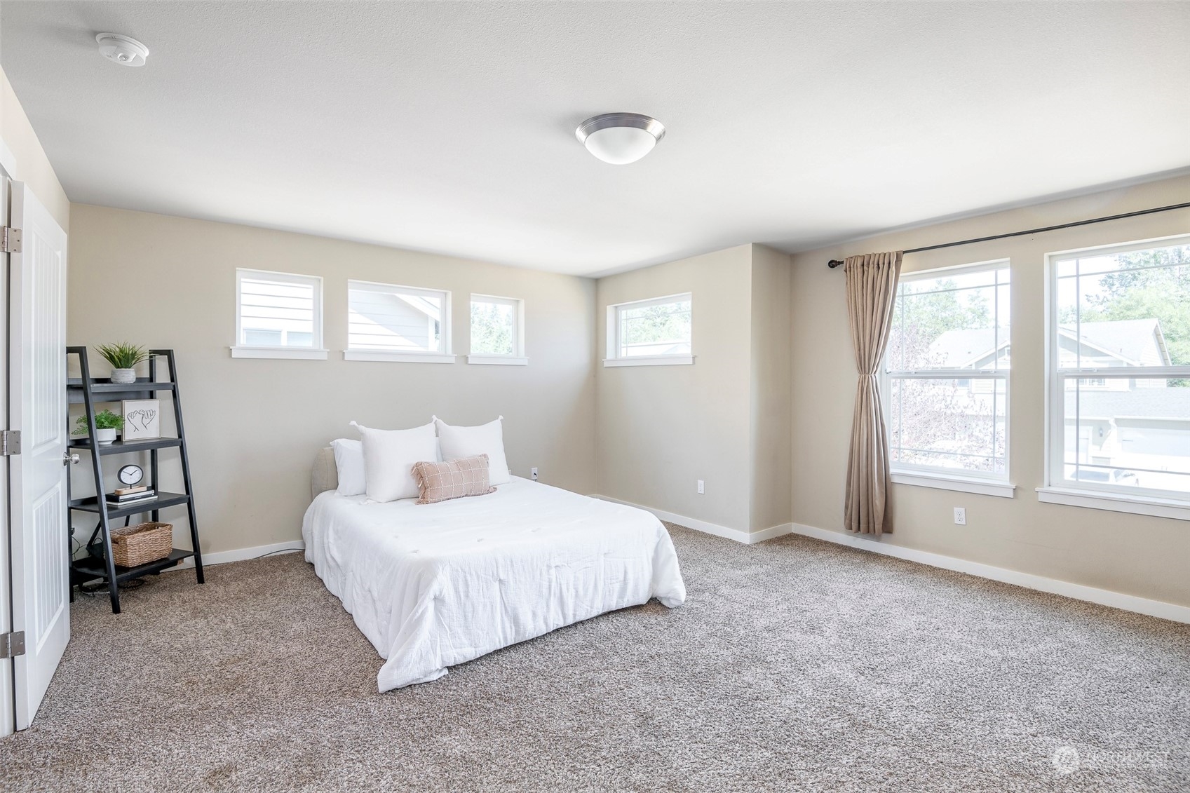 14453 98th Way Southeast Yelm, WA 98597 - Photo 12 of 23 a bedroom with a bed and a window