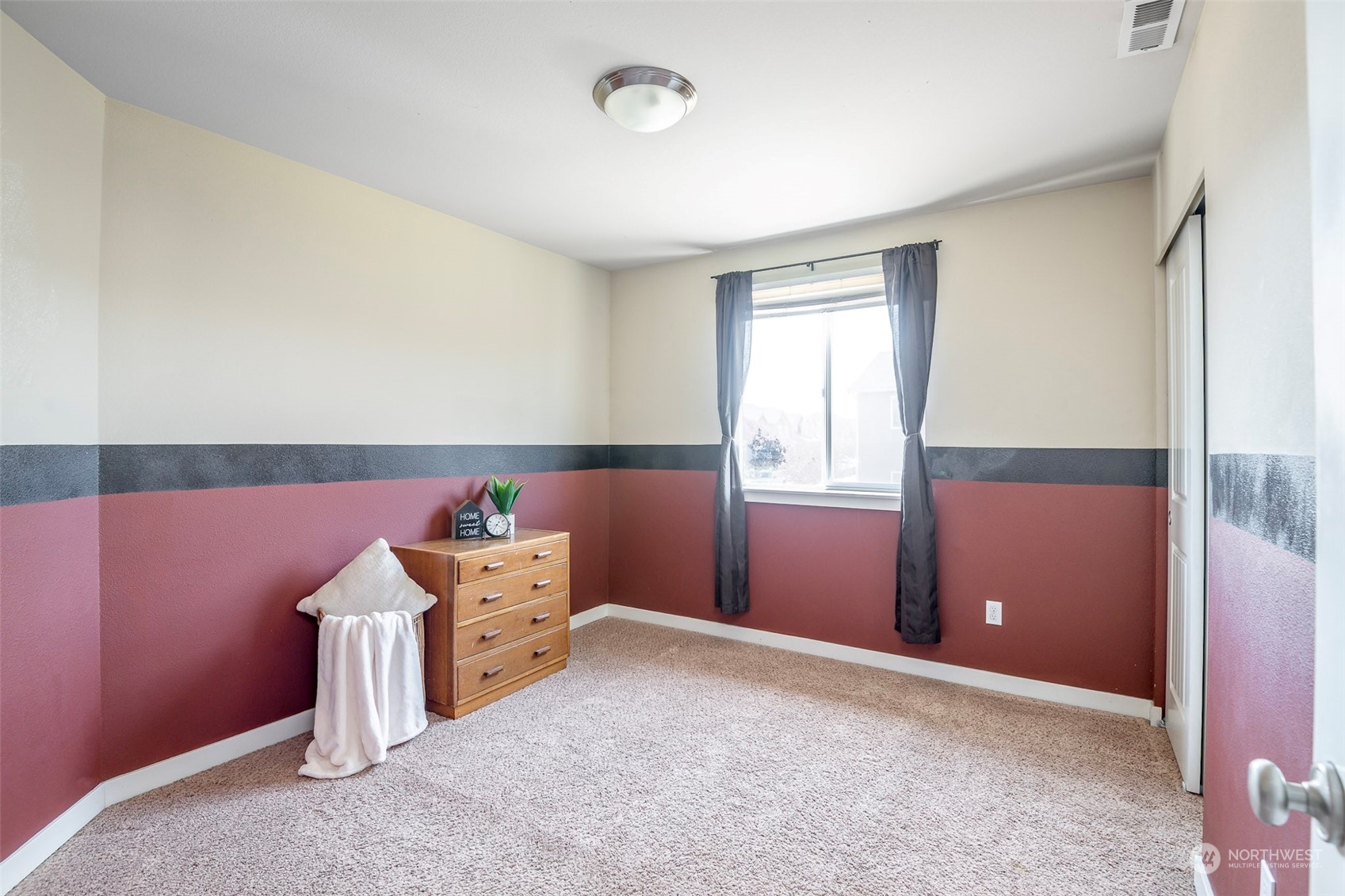 14453 98th Way Southeast Yelm, WA 98597 - Photo 18 of 23 a room with window and cabinet