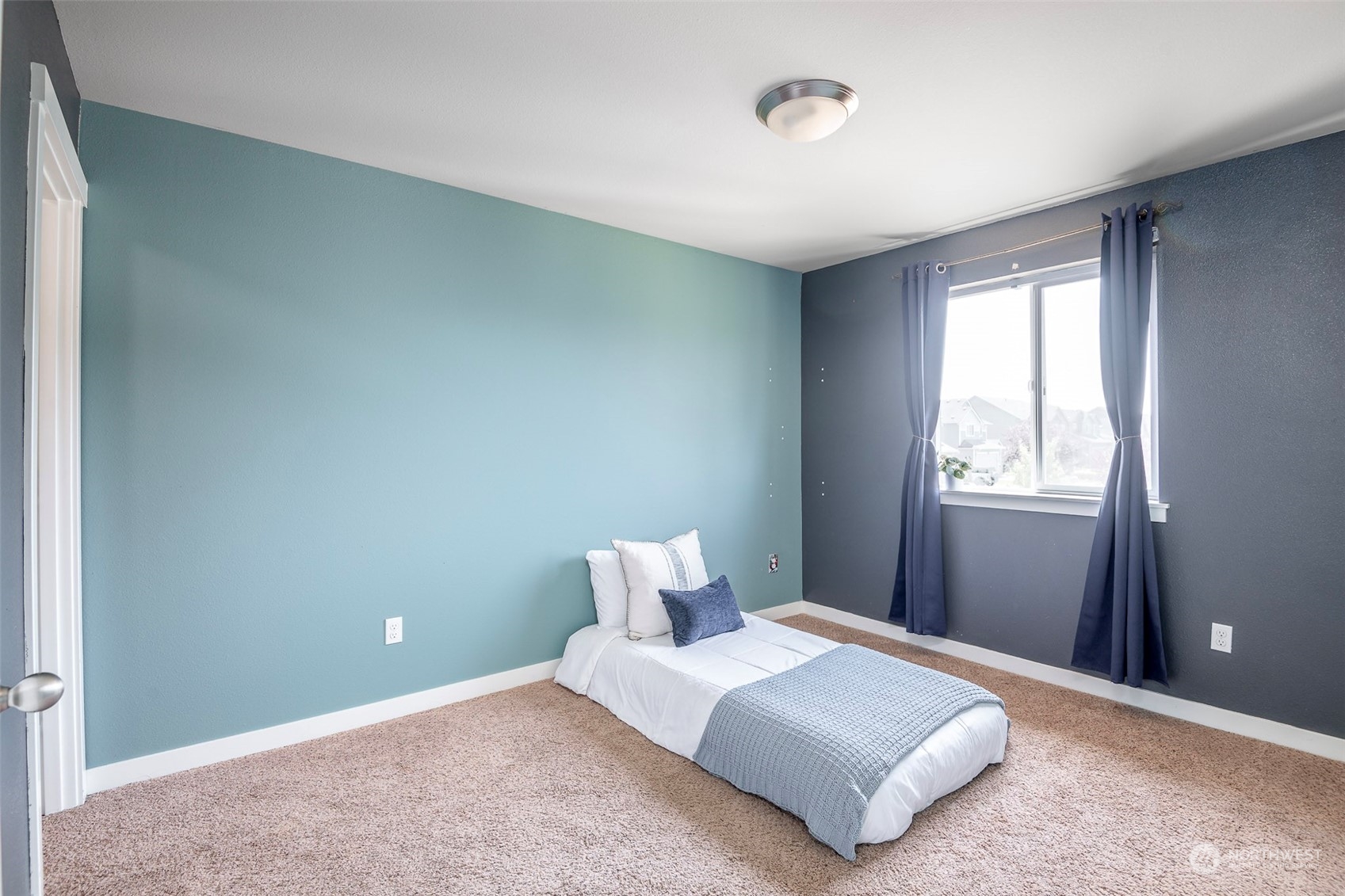 14453 98th Way Southeast Yelm, WA 98597 - Photo 19 of 23 a bedroom with a bed and a window