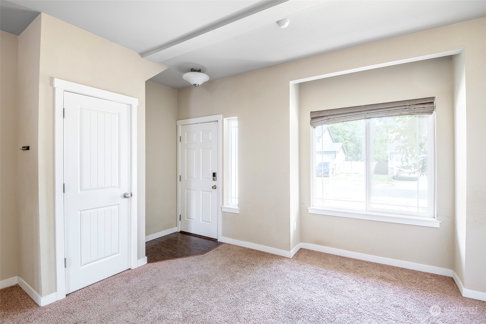 14453 98th Way Southeast Yelm, WA 98597 - Photo 3 of 23 a view of an empty room with a window