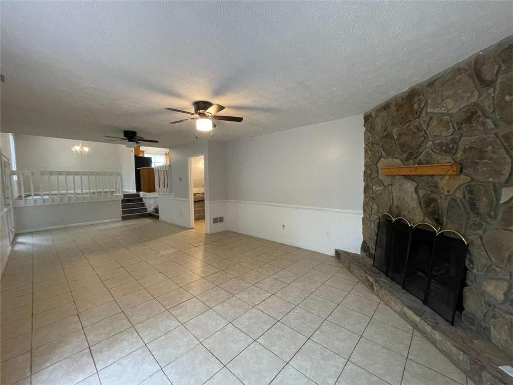 1088 Riva Ridge Drive Northwest Norcross, GA 30093 - Photo 12 of 43 a view of a livingroom with a fireplace