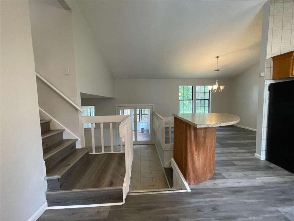 1088 Riva Ridge Drive Northwest Norcross, GA 30093 - Photo 2 of 43 a view of entryway with stairs and wooden floor