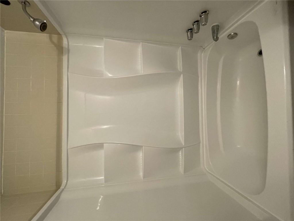 1088 Riva Ridge Drive Northwest Norcross, GA 30093 - Photo 22 of 43 a bathroom with a shower