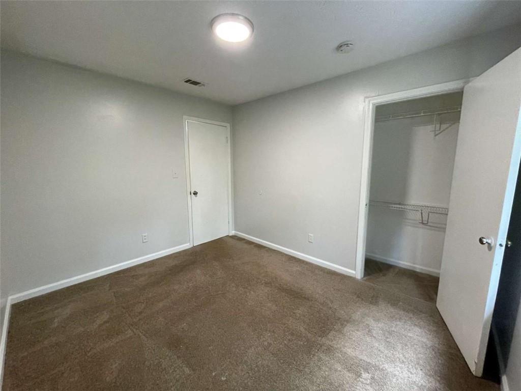 1088 Riva Ridge Drive Northwest Norcross, GA 30093 - Photo 24 of 43 an empty room with entrance