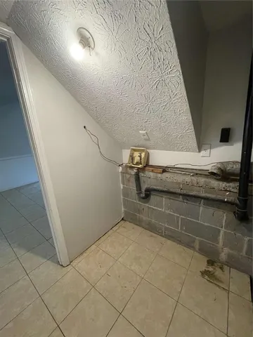 a view of storage and utility room