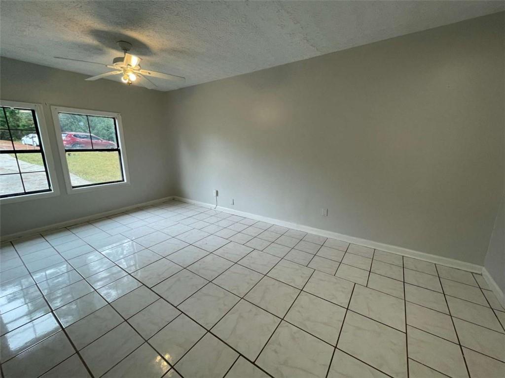 1088 Riva Ridge Drive Northwest Norcross, GA 30093 - Photo 28 of 43 a view of an empty room and window
