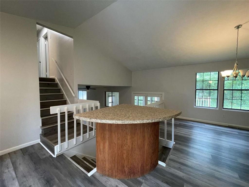 1088 Riva Ridge Drive Northwest Norcross, GA 30093 - Photo 3 of 43 a dinning room with a table and chairs