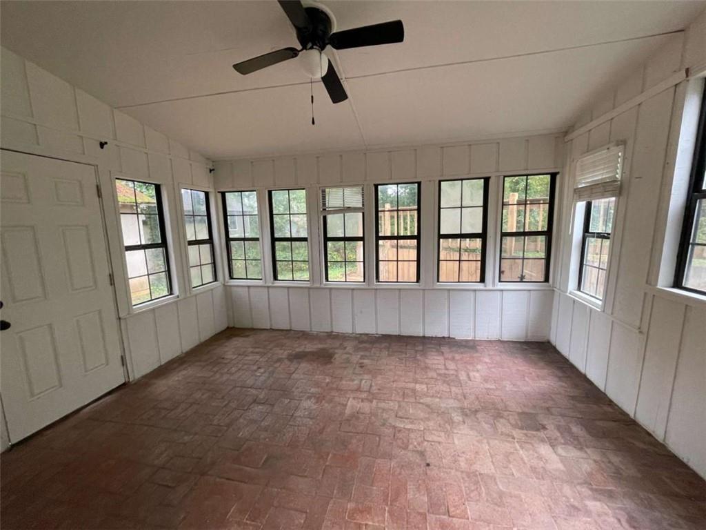 1088 Riva Ridge Drive Northwest Norcross, GA 30093 - Photo 39 of 43 wooden floor in an empty room with a window