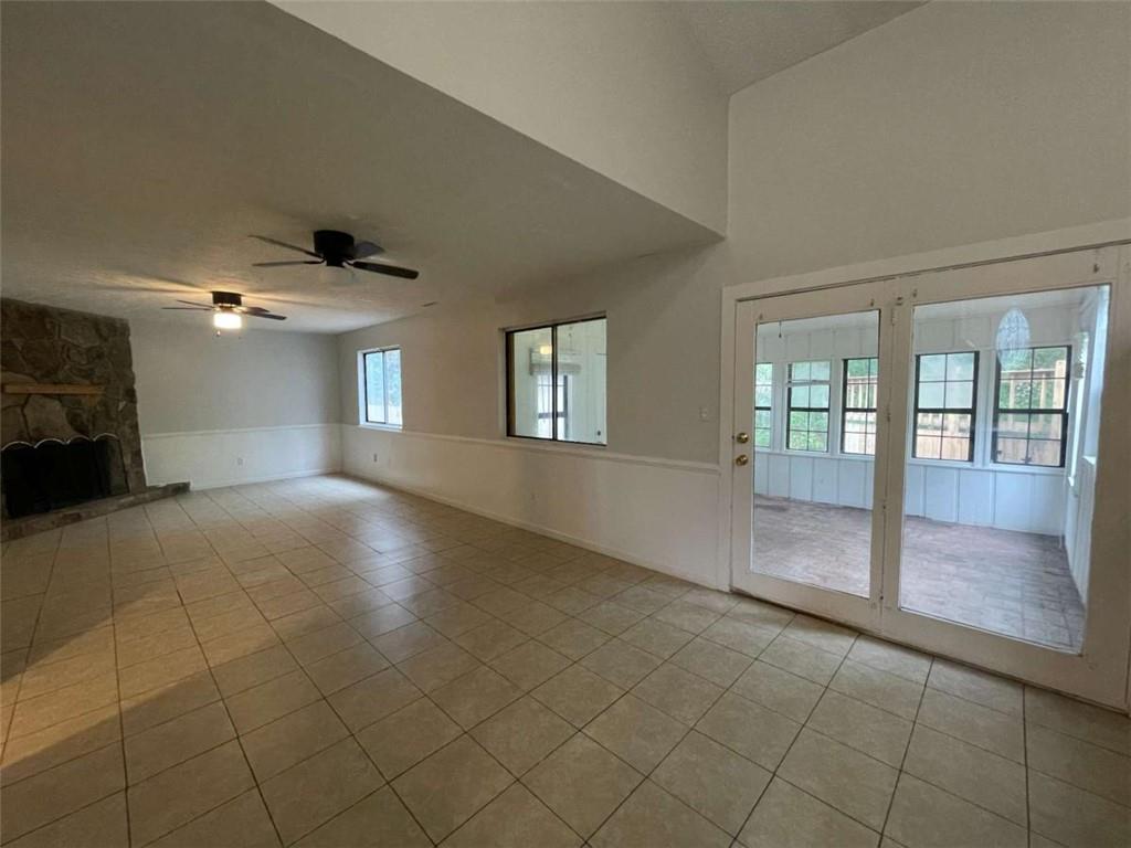 1088 Riva Ridge Drive Northwest Norcross, GA 30093 - Photo 10 of 43 a view of empty room with wooden floor and fan