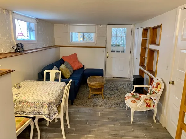 a living room with furniture and a table