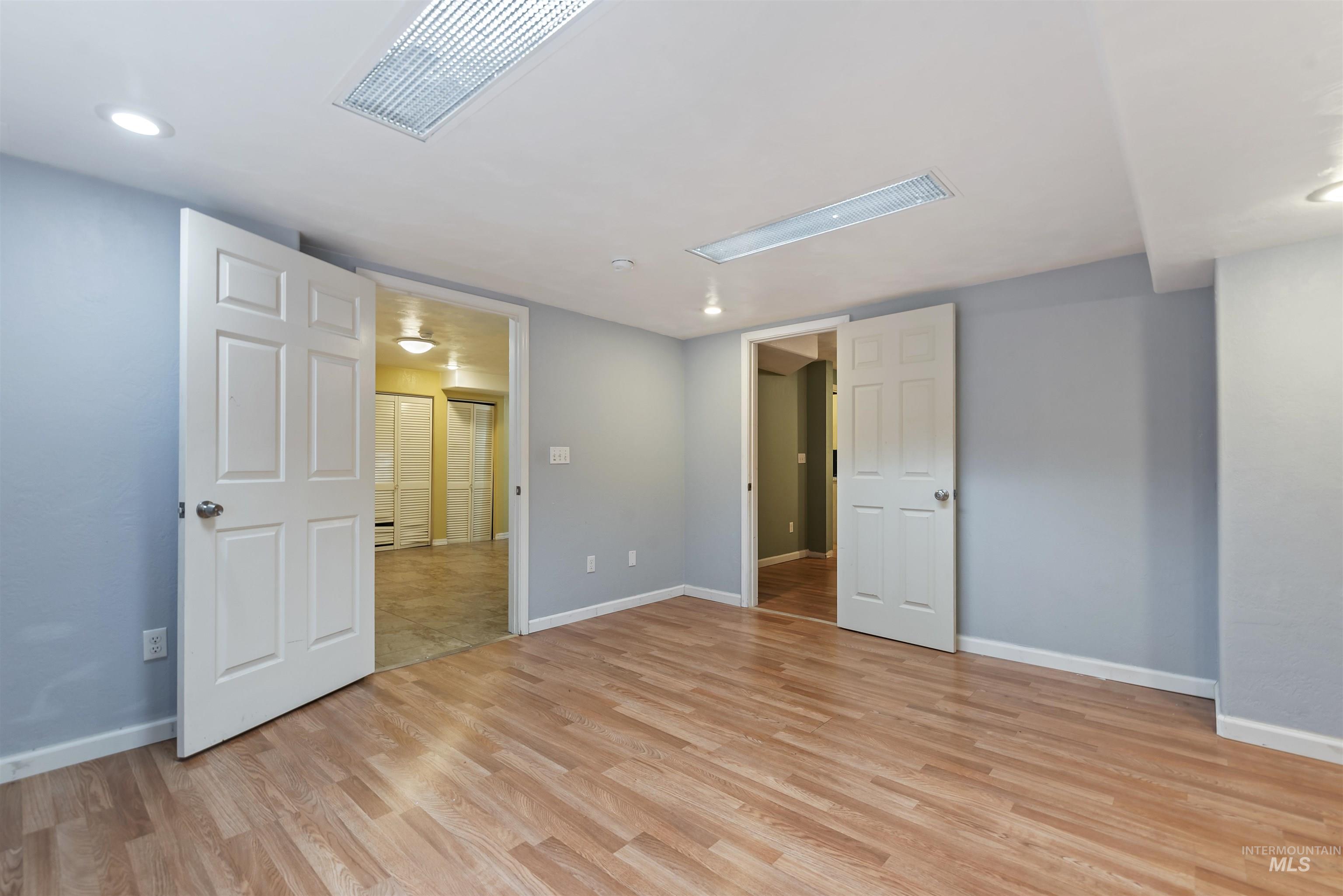 3160 East Springwood Drive Meridian, ID 83642 - Photo 19 of 41 Unfurnished bedroom with recessed lighting and light wood-style flooring