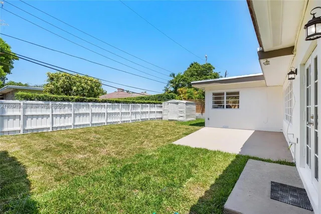 a view of a backyard with a garden