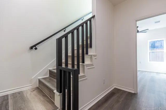 a view of entryway with wooden floor