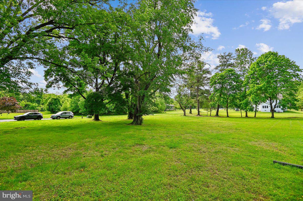 1509 Duvall Road Annapolis, MD 21409 - Photo 11 of 39 a huge green field with lots of trees