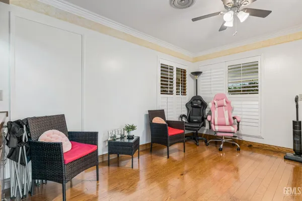 a living room with furniture and air hockey table