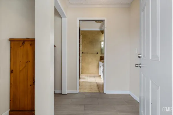a view of a bathroom with a glass door