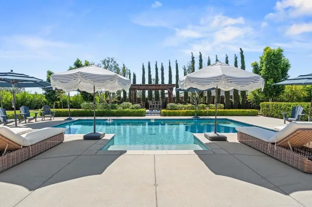 a view of outdoor space yard swimming pool and outdoor seating