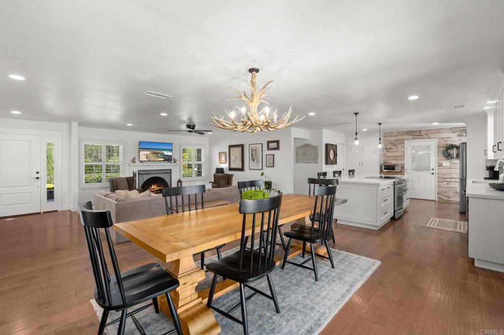 1848 Tavern Road Alpine, CA 91901 - Photo 12 of 45 a view of a dining room with furniture and wooden floor