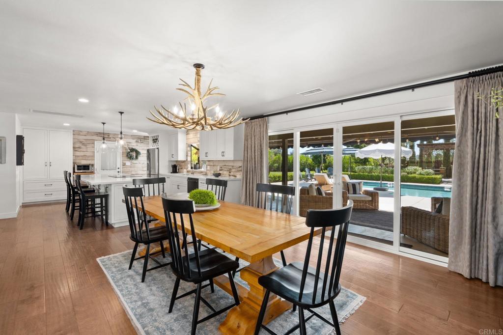 1848 Tavern Road Alpine, CA 91901 - Photo 13 of 45 a view of a dining room with furniture window and wooden floor