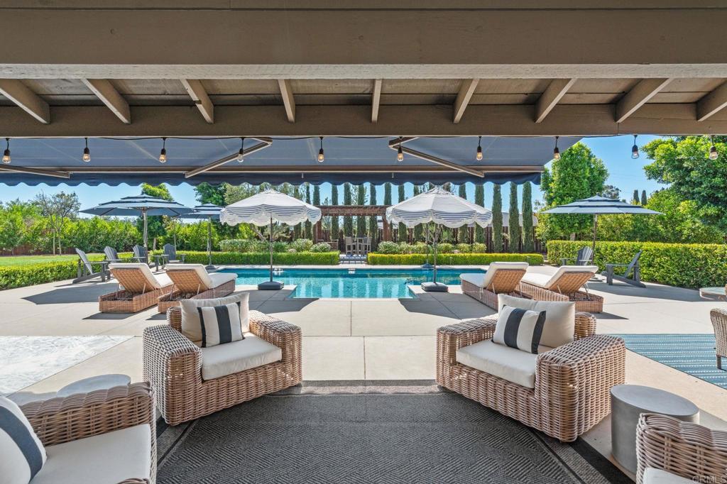 1848 Tavern Road Alpine, CA 91901 - Photo 14 of 45 a view of a patio with couches and a big yard