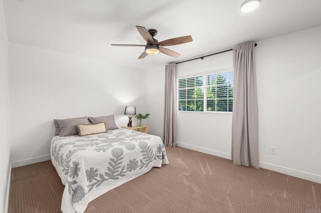 1848 Tavern Road Alpine, CA 91901 - Photo 30 of 45 a bedroom with a bed and a window