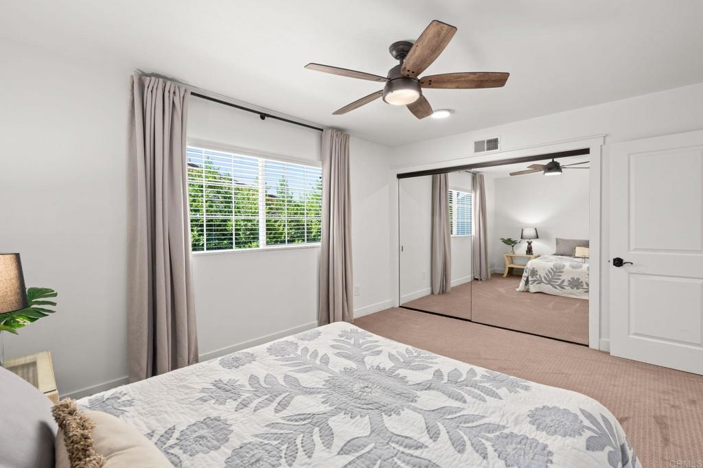 1848 Tavern Road Alpine, CA 91901 - Photo 31 of 45 a bedroom with a large bed and a window