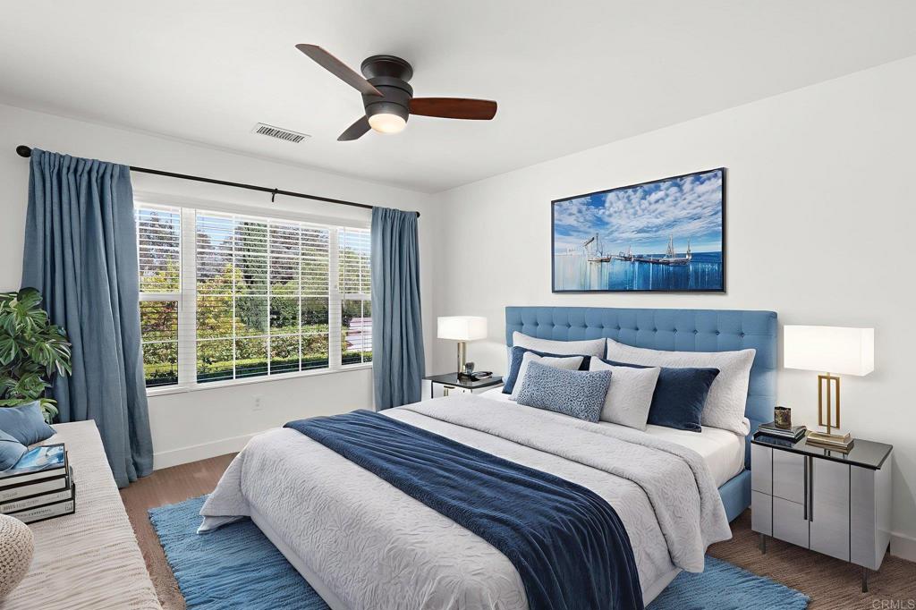 1848 Tavern Road Alpine, CA 91901 - Photo 37 of 45 a bedroom with a large bed and a large window